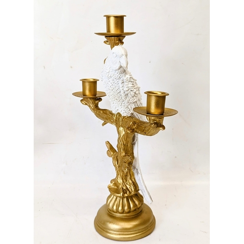 227 - A pair of ornate gilt candelabras. 30.5cm