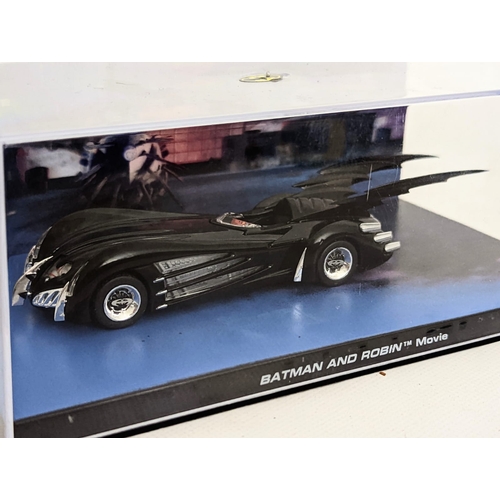 245 - 2 models from Batman and Robin 1997. With 2 Batman Automobile magazines. Model and case measure 18.5... 