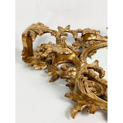 256 - A Victorian ornate gilt framed mirror. Circa 1860. 44 x 56cm