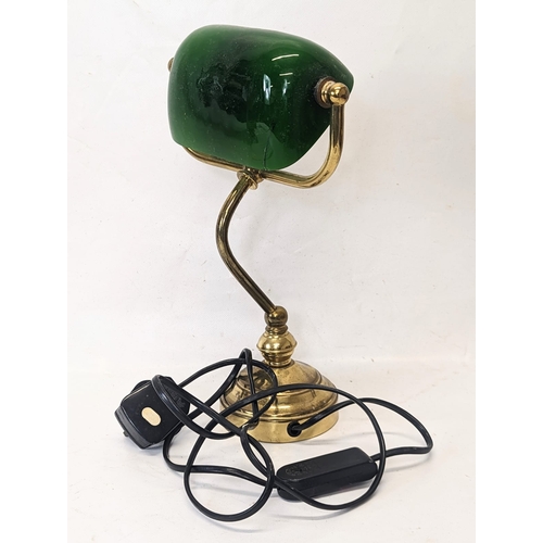 258 - A brass bankers desk lamp with glass shade. 31cm