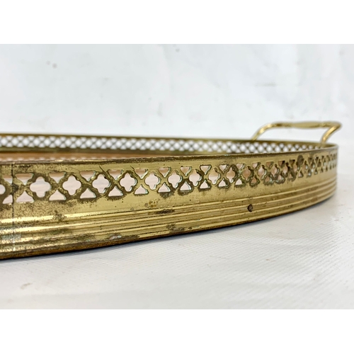 260 - An Italian Sorrento inlaid brass serving tray. 52cm