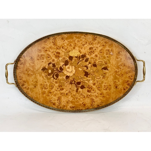 260 - An Italian Sorrento inlaid brass serving tray. 52cm