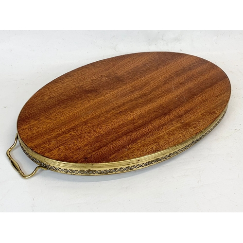 260 - An Italian Sorrento inlaid brass serving tray. 52cm