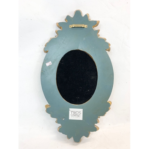 271 - A modern ornate gilt framed mirror 26 x 52cm