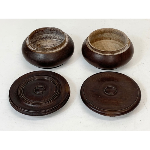 273 - A near pair of wooden spice jars with lids. 14 x 8cm