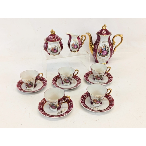 557 - A 13 piece decorative Japanese coffee set.