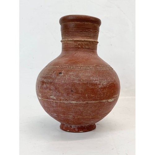 277 - An early 20th century Indian terracotta pot and a Marai terracotta pot. 29cm