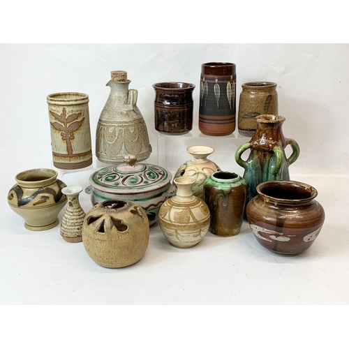 570 - A good collection of signed Studio Pottery.