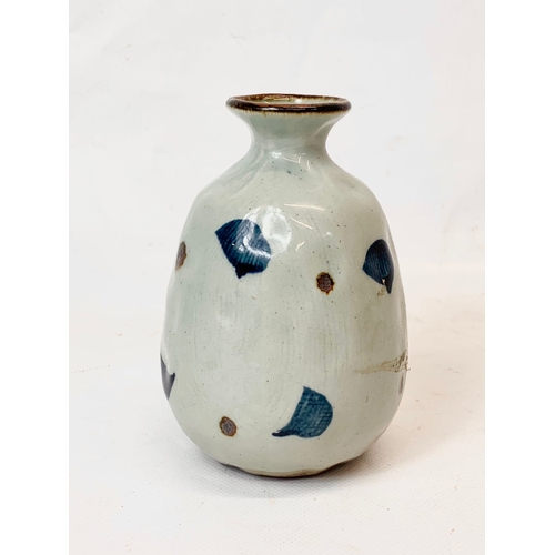 572 - An early 20th century Chinese glazed pottery vase. 12cm