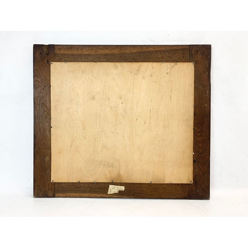 292 - A late 19th, early 20th century oak framed mirror. 60 x 52cm