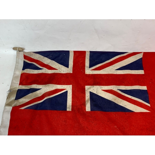 303 - An early 20th century British Navy flag. Union Jack. 113cm