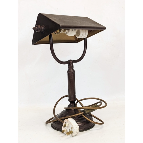 324 - A bronzed effect desk lamp. 36.5cm