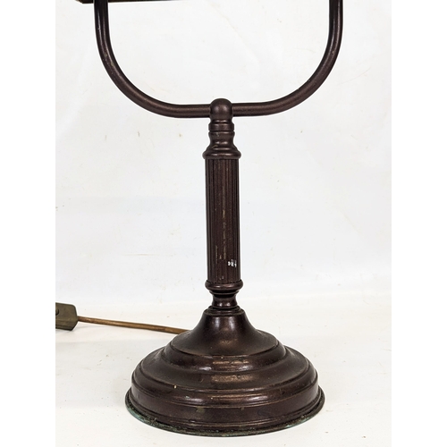 324 - A bronzed effect desk lamp. 36.5cm