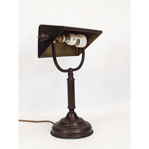 324 - A bronzed effect desk lamp. 36.5cm