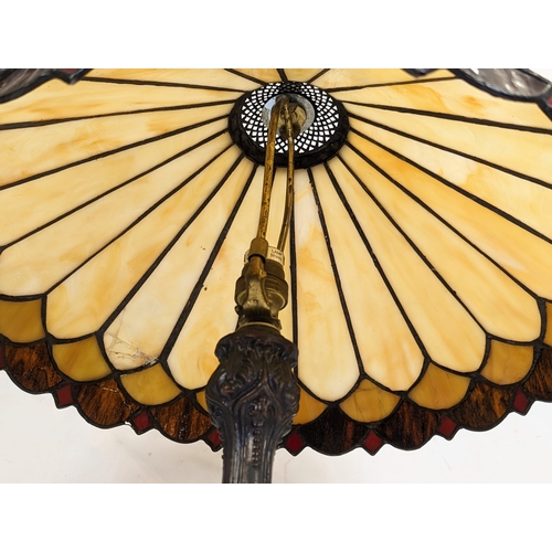 326 - A Tiffany style lamp. 66cm