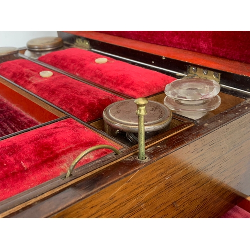 327 - A Victorian rosewood vanity box with key. 30.5 x 23.5 x 16.5cm