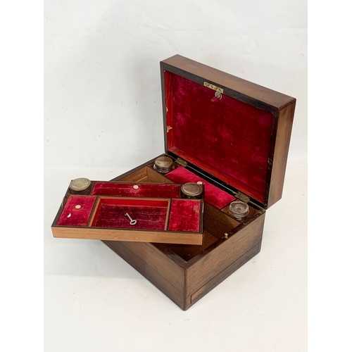 327 - A Victorian rosewood vanity box with key. 30.5 x 23.5 x 16.5cm