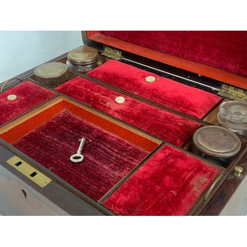 327 - A Victorian rosewood vanity box with key. 30.5 x 23.5 x 16.5cm