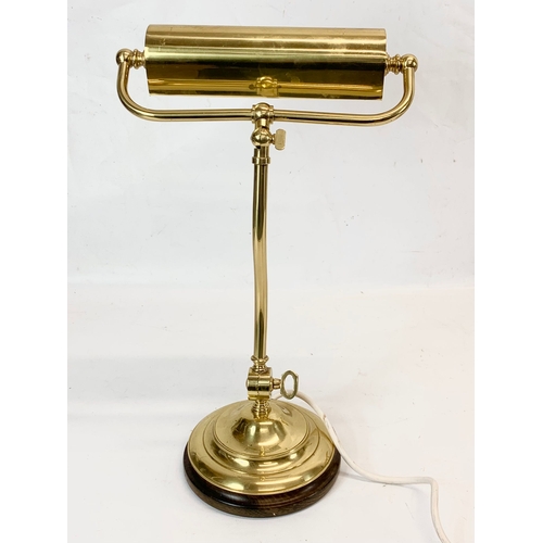 331 - A tall brass desk lamp. 40cm