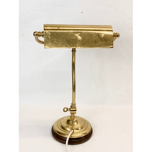 331 - A tall brass desk lamp. 40cm