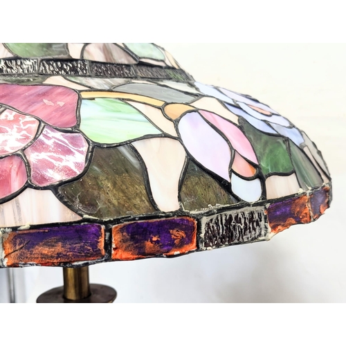 341 - A large Tiffany style lamp. Shade measures 63x23cm