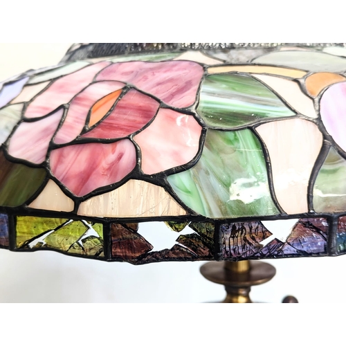 341 - A large Tiffany style lamp. Shade measures 63x23cm