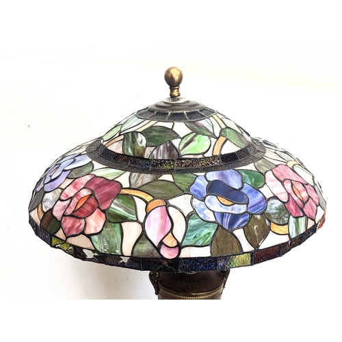 341 - A large Tiffany style lamp. Shade measures 63x23cm