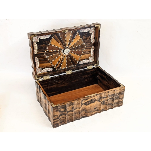 344 - A Mid 19th century Anglo-Indian coromandel wood workbox, inlaid with bone. 39.5x25x16.5cm