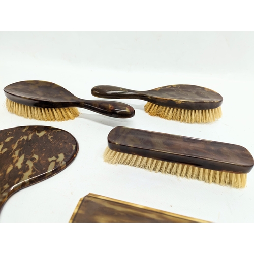 351 - A faux tortoise shell vanity set