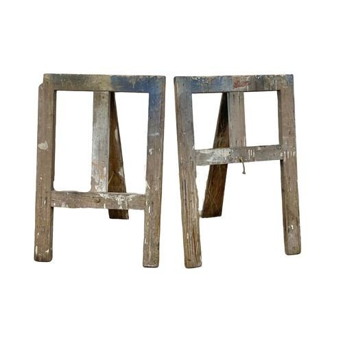 56 - A pair of early 20th century trestle stands. 57 x 83cm
