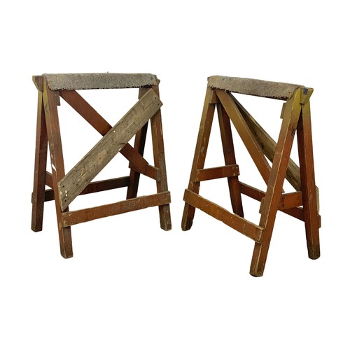 58 - A pair of large early 20th century pine trestle stands with original paint. 78 x 92.5cm