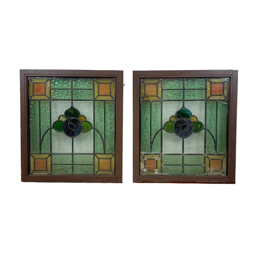 194 - A pair of Victorian stained glass panels in frame. 62.5 x 69cm