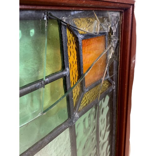 194 - A pair of Victorian stained glass panels in frame. 62.5 x 69cm