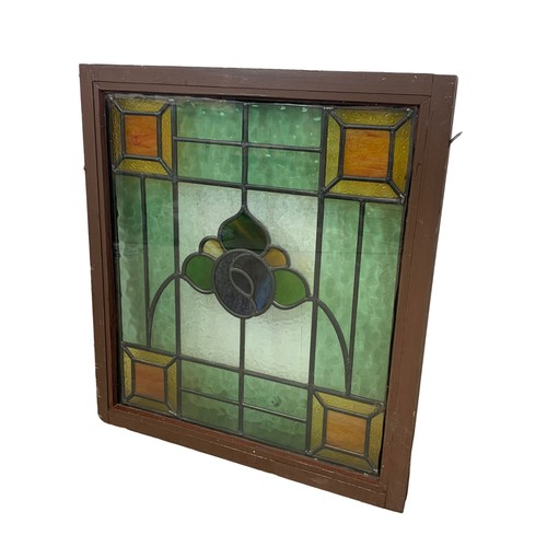 194 - A pair of Victorian stained glass panels in frame. 62.5 x 69cm