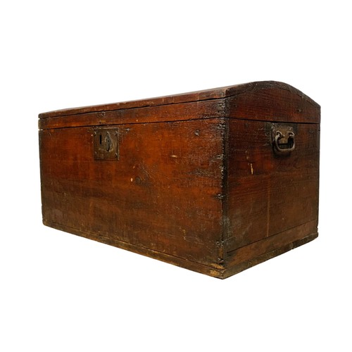 266 - A Victorian pine dome top trunk. 61 x 38.5 x 33cm