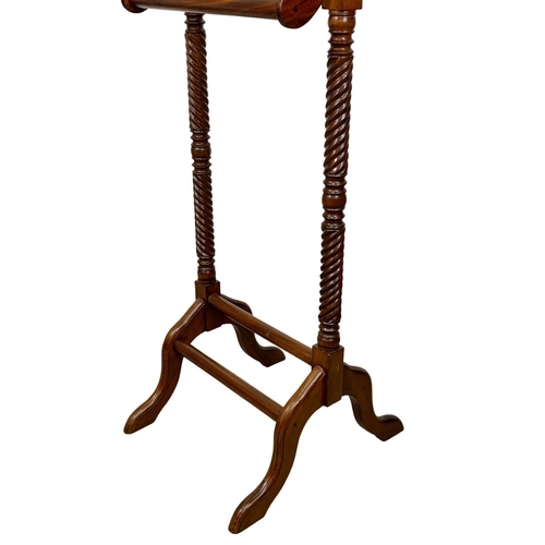 1130 - A large mahogany valet stand with 2 drawers. 126.5cm