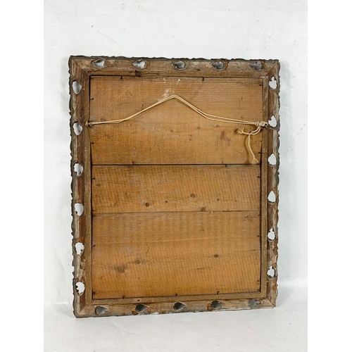 354 - A Victorian ornate gilt framed mirror. 49 x 60cm