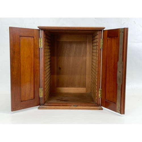 378 - An Edwardian inlaid mahogany collectors cabinet. 33 x 32.5 x 42cm