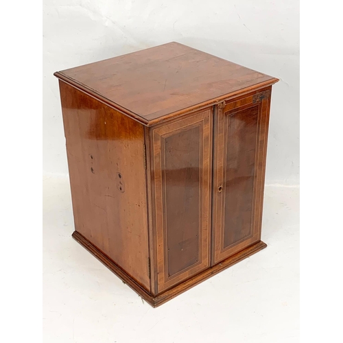 378 - An Edwardian inlaid mahogany collectors cabinet. 33 x 32.5 x 42cm