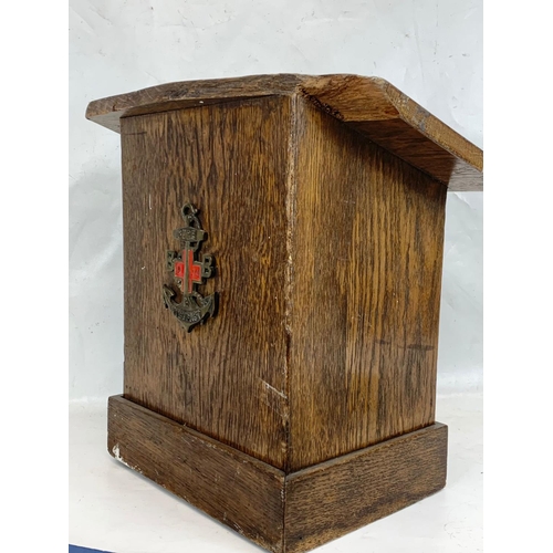 385C - A small oak lectern and a Boys Brigade sign.