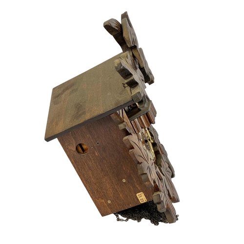 233A - Vintage cuckoo clock with weights and pendulum. 24 x 37cm.