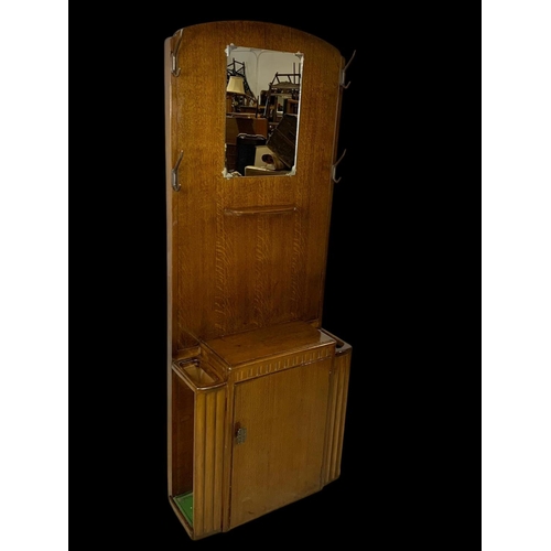 1147 - An Art Deco walnut hallstand by Lebus Furniture. Circa 1950. 69x28x170cm