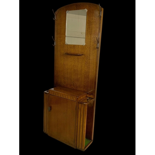 1147 - An Art Deco walnut hallstand by Lebus Furniture. Circa 1950. 69x28x170cm