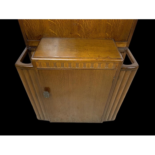 1147 - An Art Deco walnut hallstand by Lebus Furniture. Circa 1950. 69x28x170cm