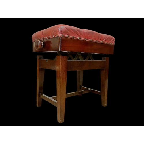 1148 - An Edwardian adjustable stool with red buttoned leather seat. 57 x 38 x 54cm fully adjusted.