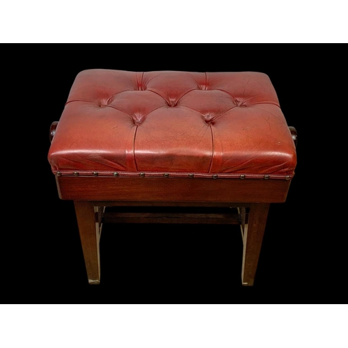 1148 - An Edwardian adjustable stool with red buttoned leather seat. 57 x 38 x 54cm fully adjusted.