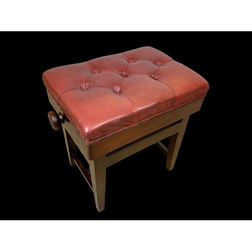 1148 - An Edwardian adjustable stool with red buttoned leather seat. 57 x 38 x 54cm fully adjusted.