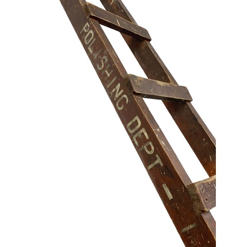 278C - An early 20th century industrial pine ladder in original paint. Polishing Department. 317cm