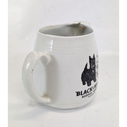 778D - A vintage Black & White Scotch Whisky water jug. 17.5x12.5cm