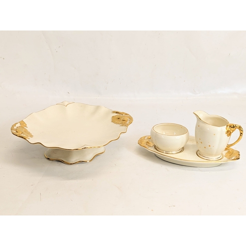 778F - A 1930s Royal Winston pottery set.